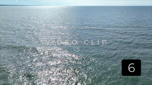 CLIP 6 -  Erie, PA Presque Isle State Park slow flight over Lake Erie in afternoon sunshine