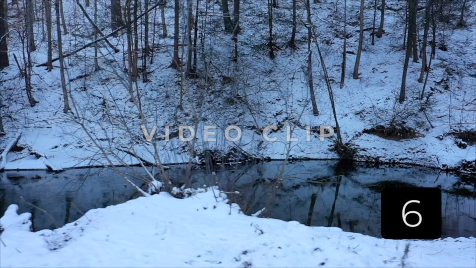 CLIP 6 - Rochester, NY Vol. 7 - Snow covered hillside beside Irondequoit creek in Winter at Ellison Park, NY
