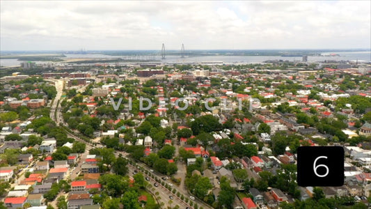CLIP 6 - Charleston, SC flying over urban neighborhood with homes and street traffic