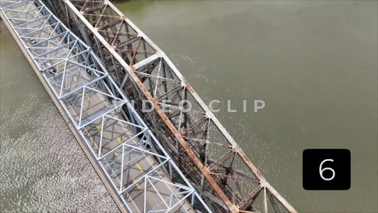 CLIP 6 - Cincinnati, Ohio looking down on section of car and train bridges over Ohio river