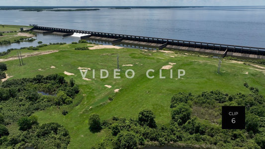 Stock video CLIP 6 - Lake Marion, SC aerial turning slowly to reveal Santee River Dam