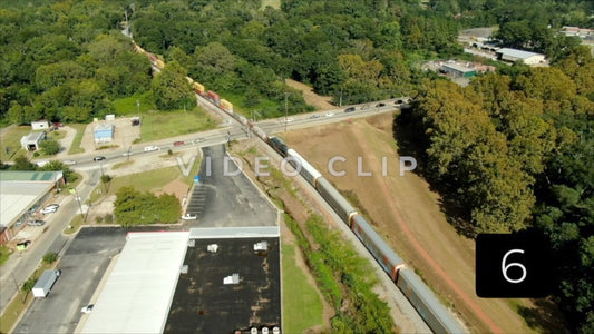 CLIP 6 - Montezuma, GA aerial of train traveling through town