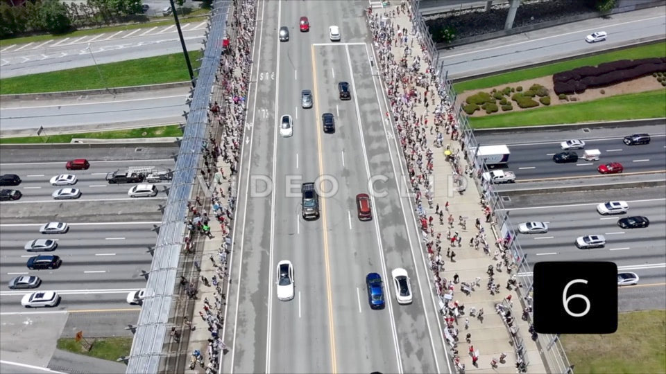 CLIP 6 - Atlanta, GA No Kings Protest - Flight above highway overpass with protesters below