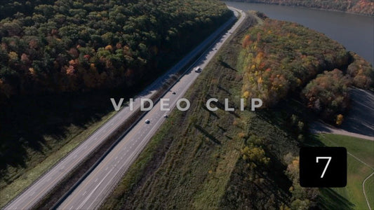 CLIP 7 - Tioga Dam and Reservoir, PA following cars on highway around mountainside