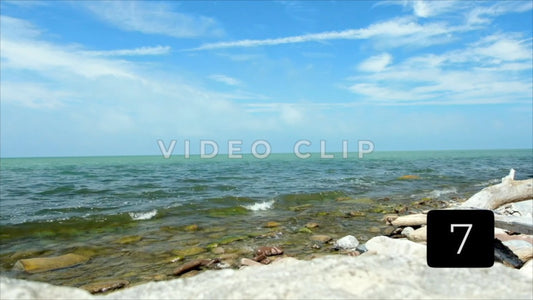 CLIP 7 - Lake Ontario Webster, NY gentle waves break along shoreline