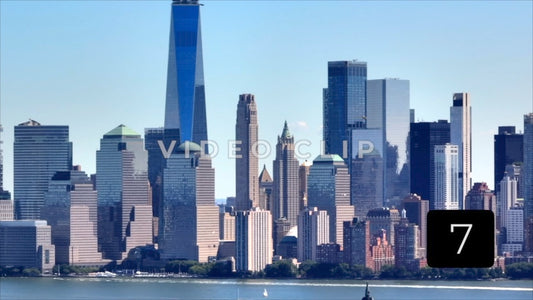 CLIP 7 - New York, NY Vol 1. - One World Trade Center and skyline as helicopter flies past office towers