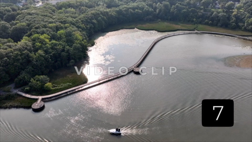 CLIP 7 - Rochester, NY Vol. 4 - Genesee Riverway Trail boardwalk in afternoon sunlight with boat passing by