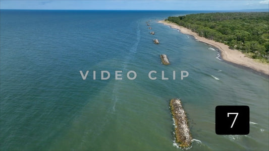 CLIP 7 -  Erie, PA Presque Isle State Park low flight over rocky jetties that protect shoreline