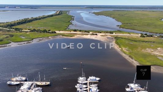 CLIP 7 - Brunswick, GA drone flight over inlet with marina and wetlands