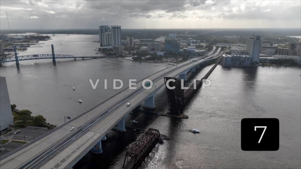 CLIP 7 - Jacksonville, FL bridge over St Johns river with boats passing underneath