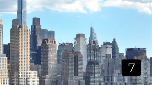 CLIP 7 - New York, NY Vol 2. - Sky view then panning down to apartment buildings and glass office towers