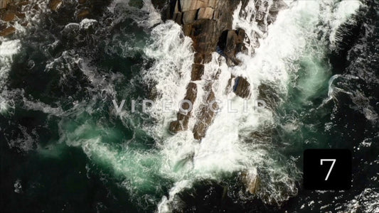 CLIP 7 - Maine Coast aerial looking down on rocky coast with ocean waves