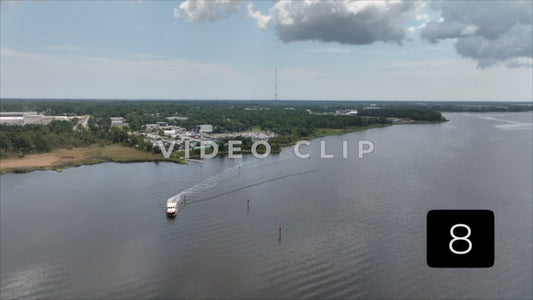 CLIP 8 - Wilmington, NC landscape with boat leaving marina on Cape Fear River
