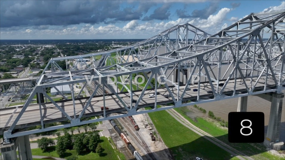 CLIP 8 - New Orleans, LA Vol. 2 - tracking the length of Crescent City Connection Bridge as traffic crosses Mississippi River
