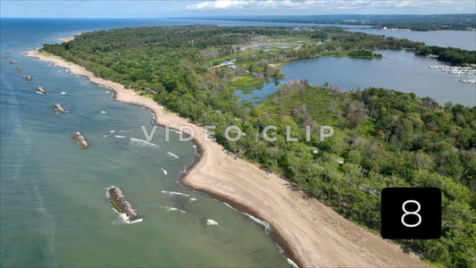 CLIP 8 -  Erie, PA Presque Isle State Park aerial of sandy shoreline with breaking waves