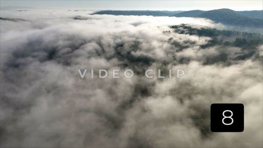 CLIP 8 - Morning fog with sunlight casting soft glow over over Tennessee mountains