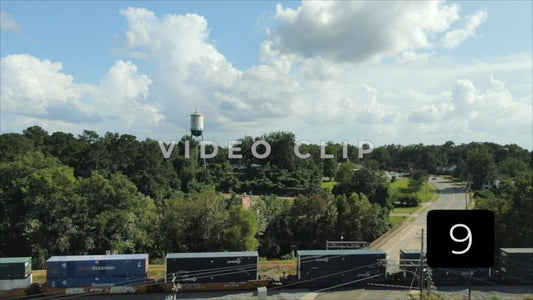CLIP 9 - Montezuma, GA train passes through town below old watertower