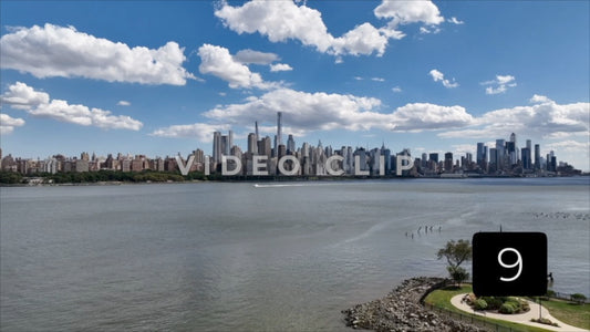 CLIP 9 - New York, NY Vol 2. - motor boat cruising on Hudson river past city skyline