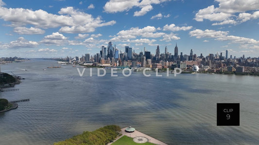 CLIP 9 - New York, NY city skyline view as cloud shadows pass over Hudson River