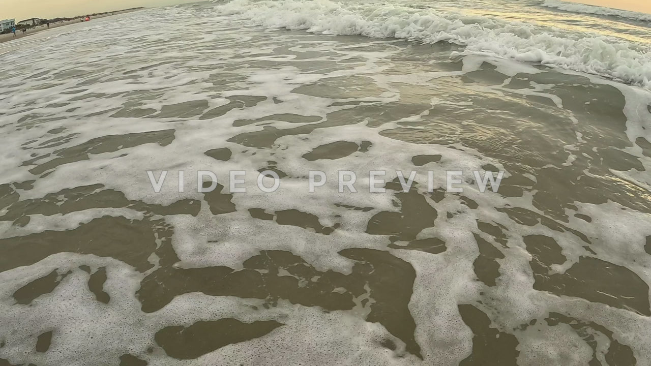 Stock video waves breaking on beach