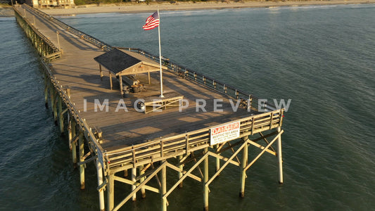stock photo american flag on fishing pier
