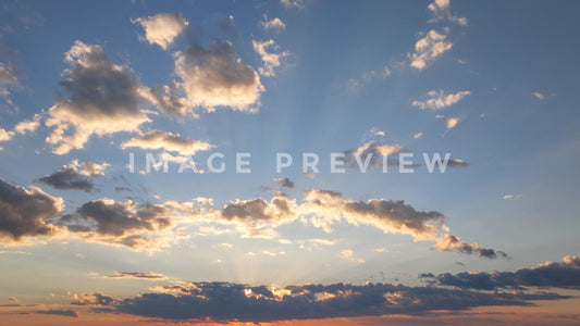 stock photo sunset with blue sky and clouds