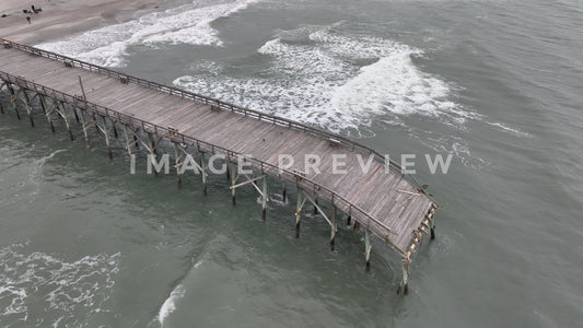 stock photo hurricane ian damage to pier in Pawleys island SC