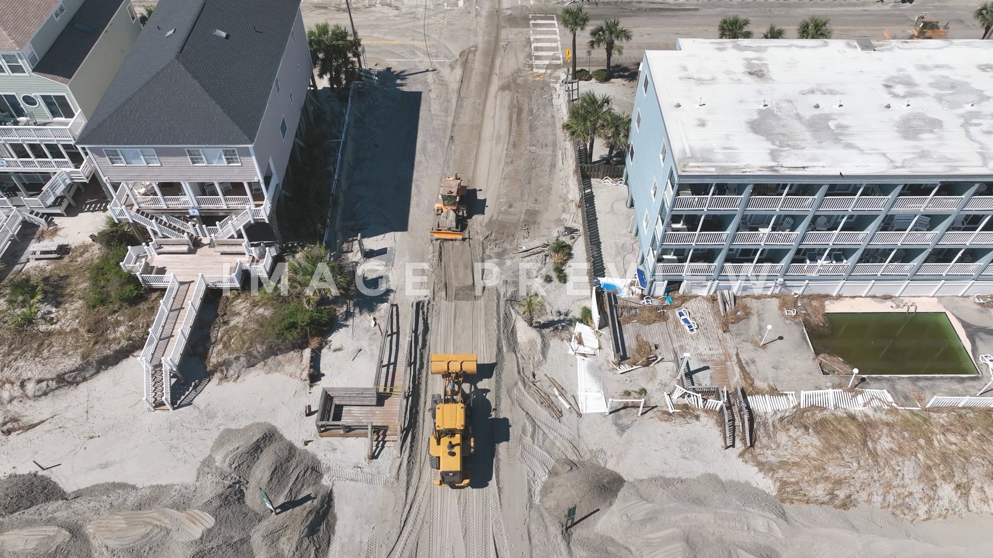 stock photo clean up after hurricane IAN damage to garden city