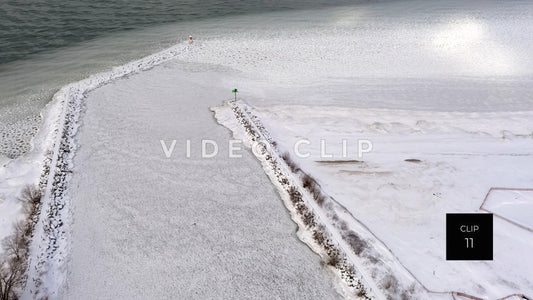 CLIP 11 - Winter Irondequoit Bay outlet pier and lighthouse at Lake Ontario, NY