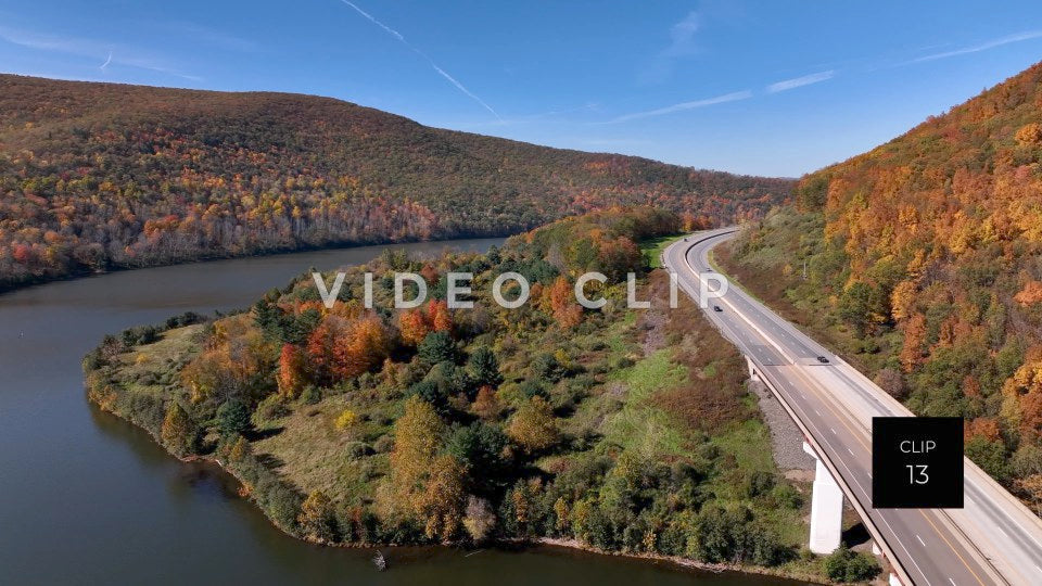 CLIP 13 - Tioga Dam and Reservoir, PA cars driving past reservoir