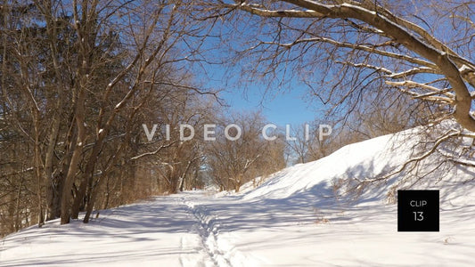 CLIP 13 - Hiking and snow mobile trail in public park during Winter with snow