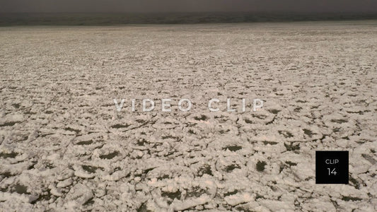 CLIP 14 - Winter Lake Ontario flying over pancake ice by the frozen shoreline