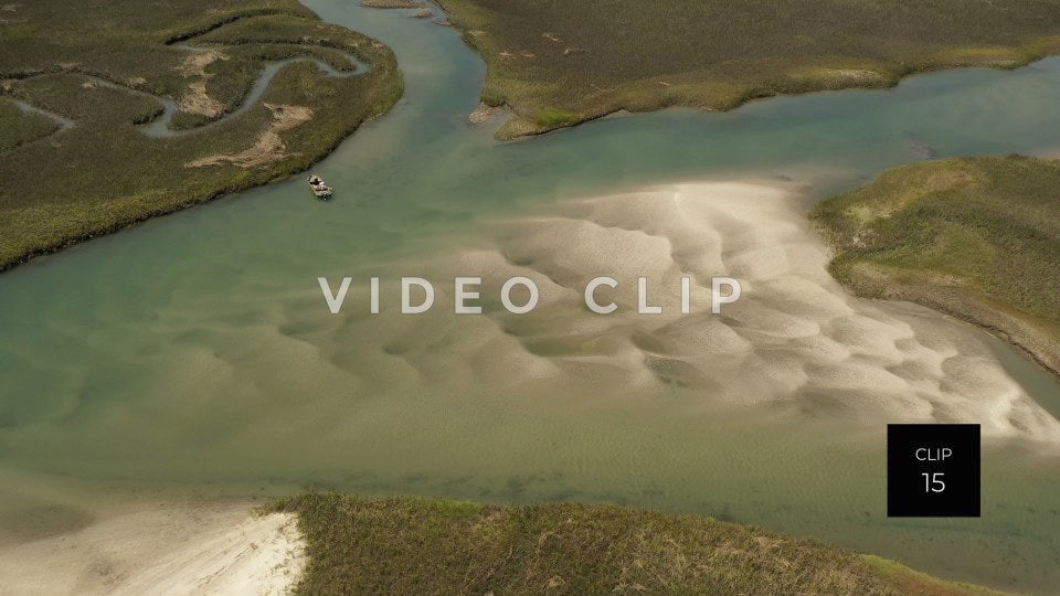 CLIP 15 - Cherry Grove Beach, SC Waties Barrier Island tidal marsh with fisherman