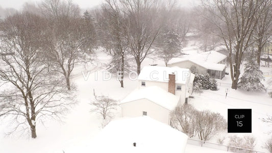 CLIP 15 - Snow covered homes in small town neighborhood