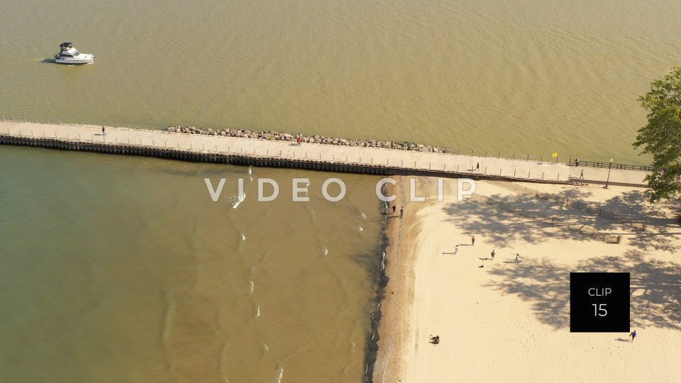 CLIP 15 - People walking shoreline at Ontario Beach Park Rochester, NY