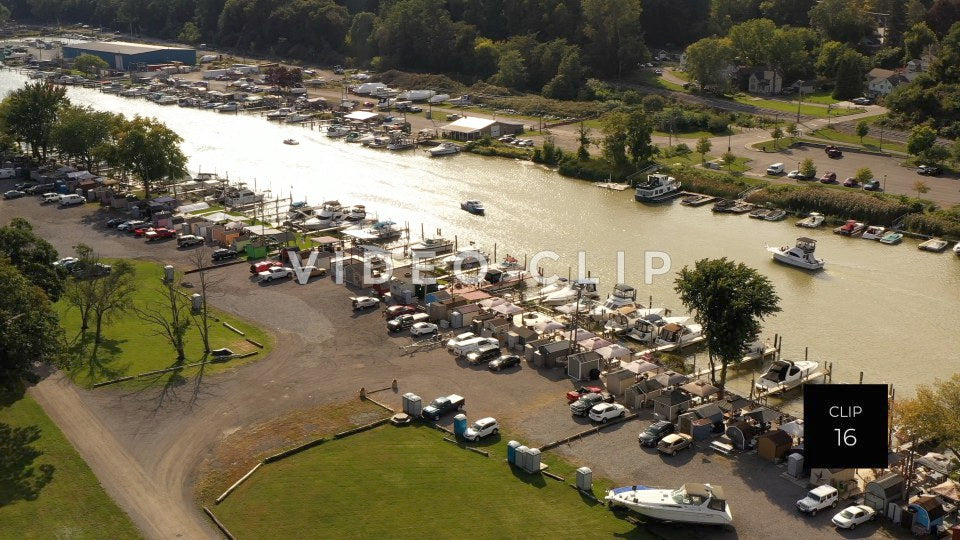 CLIP 16 - Boats motor by marina on Genesee River near Port of Rochester, NY