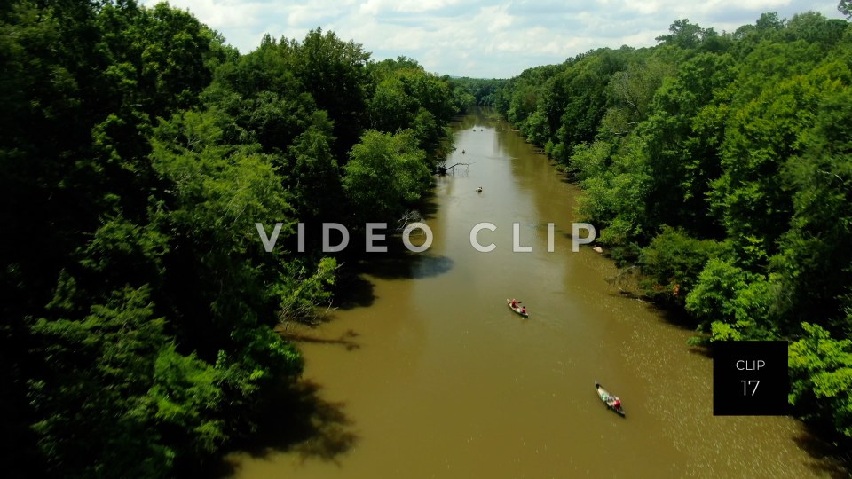 CLIP 18 - Flint River - Aerial above people in canoes paddling down river at Woodbury, GA