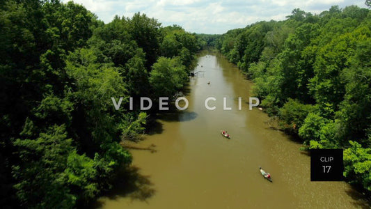 CLIP 18 - Flint River - Aerial above people in canoes paddling down river at Woodbury, GA