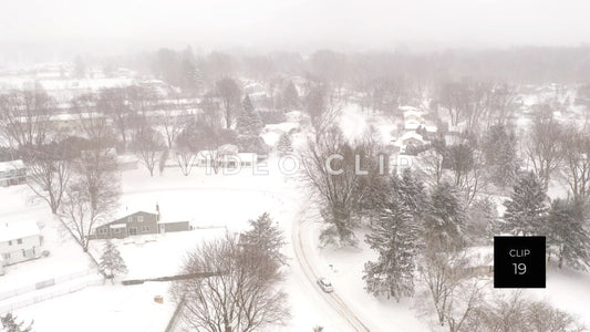 CLIP 19 - Winter snow storm blankets neighborhood homes