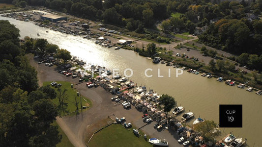 CLIP 19 - Sunlight on boats along Genesee River at Marina Rochester, NY