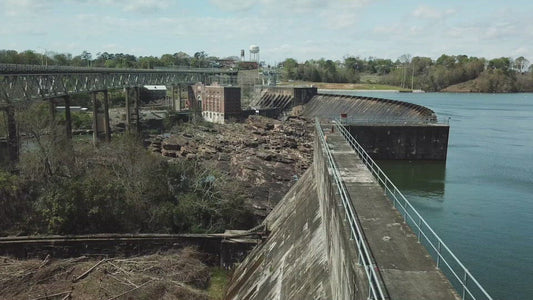 Video - Tallassee, Alabama - Thurlow Dam and bridge crossing over rocky shoals in small southern town
