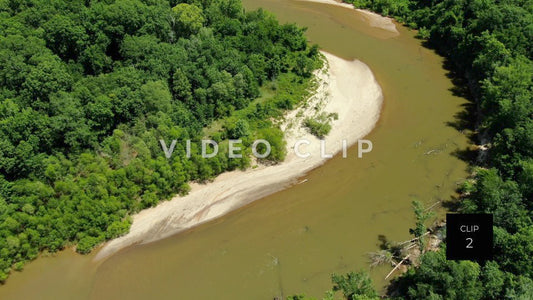 CLIP 2 - Flint River - low aerial flight over winding river through forest near Montezuma, GA