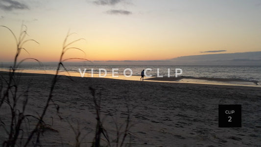 CLIP 2 - Litchfield Beach, SC person walking on beach at sunrise