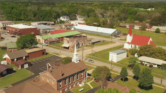 Video - Woodbury, Georgia - Slow turn around church to observe street life in a small southern town in America