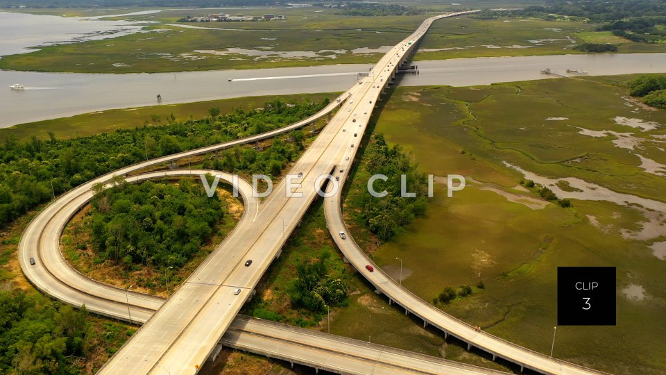 CLIP 3 - Charleston, SC highway with cars traveling over salt water marsh