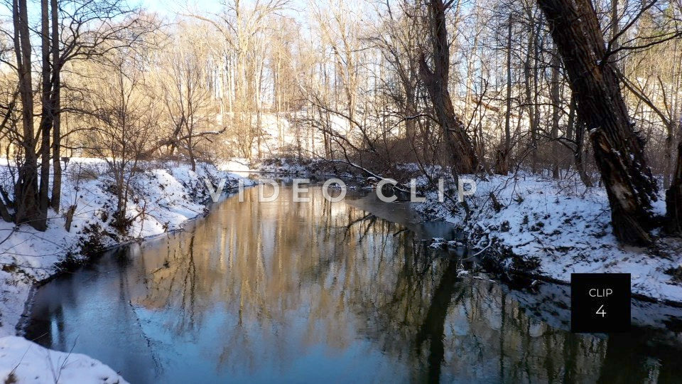 CLIP 4 - Winter snow in Ellison Park, NY with reflections in Irondequoit creek