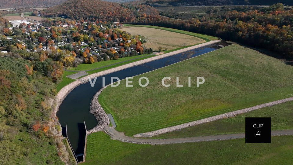 CLIP 4 - Tioga Dam and Reservoir, PA flying over canal from earthen dam