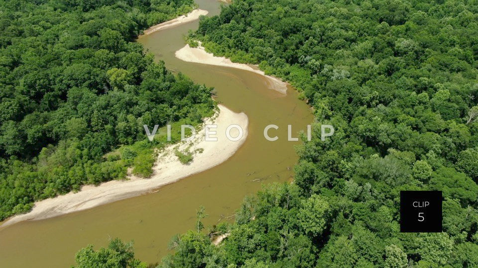 CLIP 5 - Flint River - aerial flight over river through dense forest Montezuma, GA