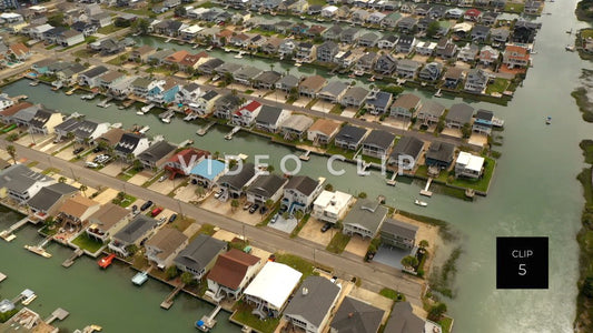 CLIP 5 - Cherry Grove Beach, SC flying over vacation beach houses and homes by the tidal marsh