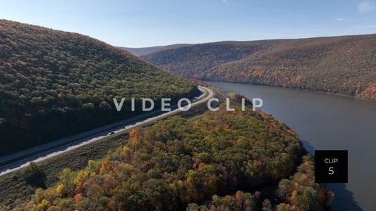 CLIP 5 - Tioga Dam and Reservoir, PA passing over reservoir towards cars traveling on road